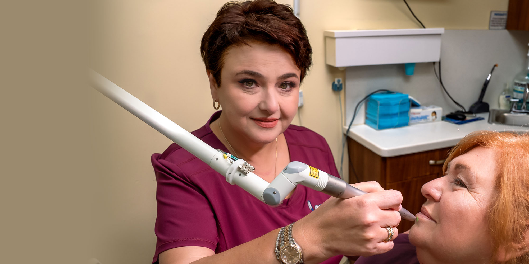 doctor holding up laser